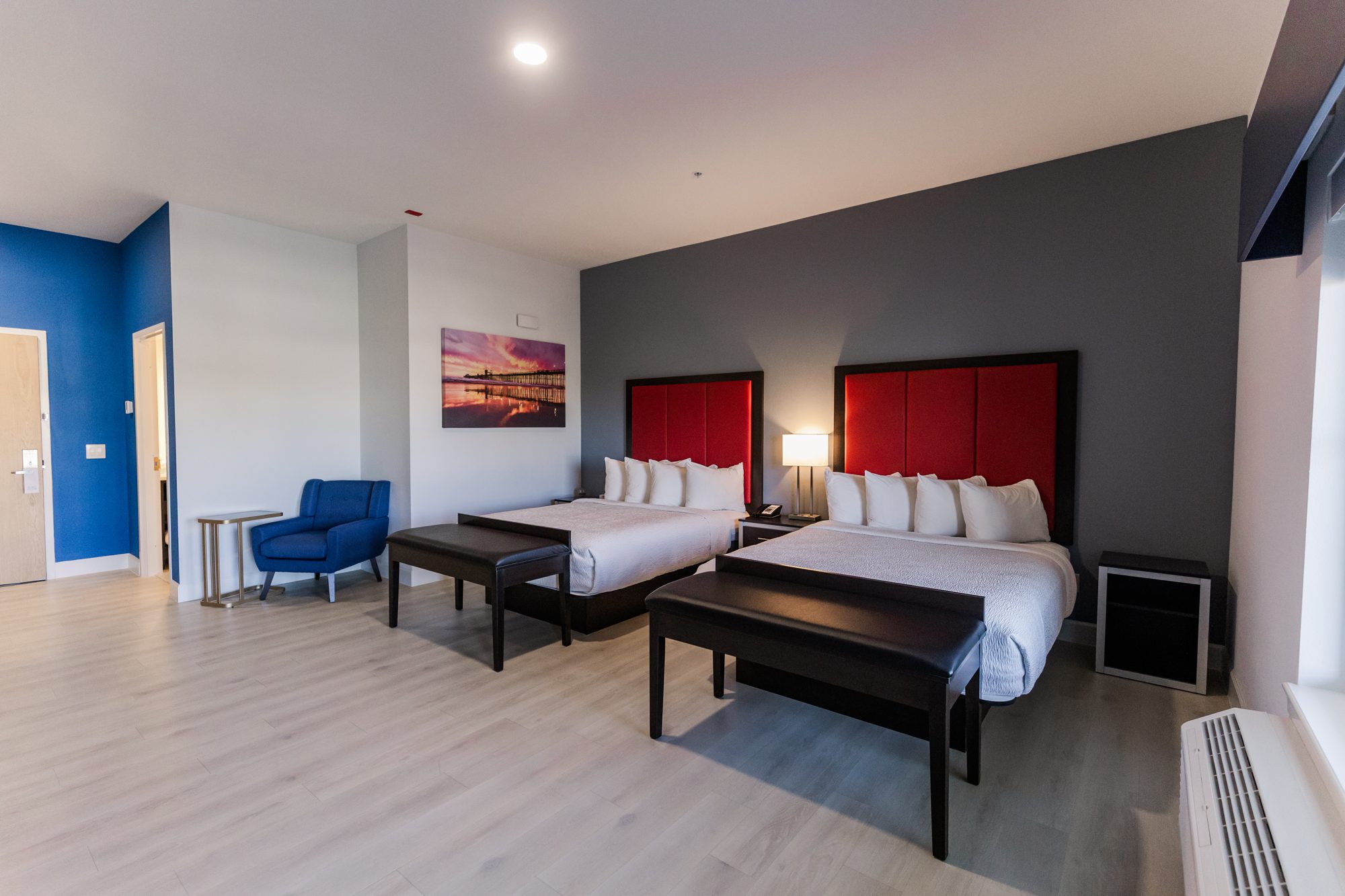 Two queen room with desk and TV